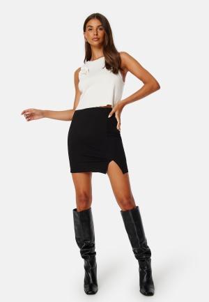 BUBBLEROOM Jen Mini Skirt Black L - recommended by Huda Jaafar