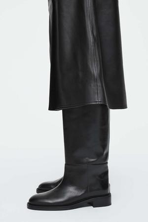 black tall boots - recommended by Claire Rose