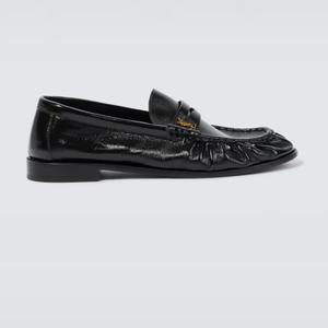 Black loafers  - recommended by Nina Retar (Nina’s favorites)