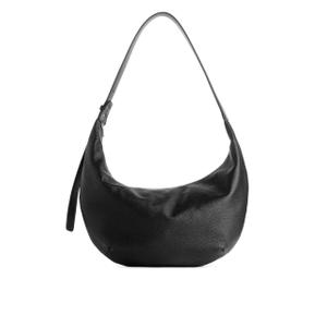 Curved Leather Bag - Black - recommended by Sofia Andersin
