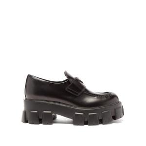 Prada - Triangle-plaque Tread-sole Leather Loafers - Womens - Black - recommended by Chriselle  Lim